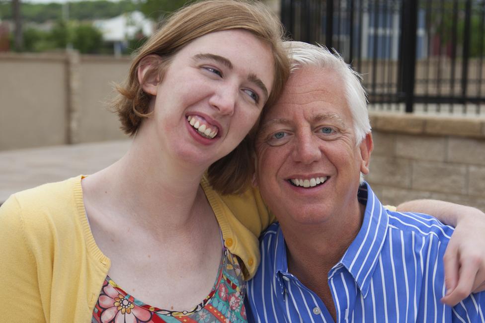 Morgan and Gordon Hartman hugging