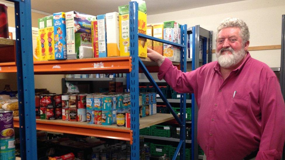 Neal Mellon in the store of the Isle of Man Foodbank