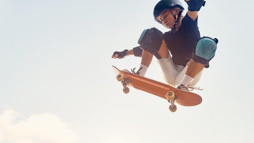 A child skateboarding