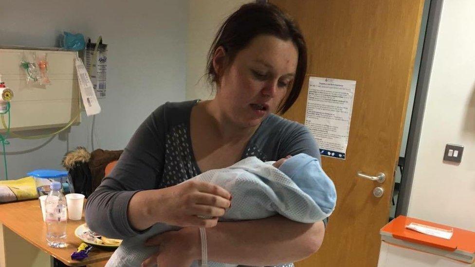 Laura Williams holding Leo in hospital