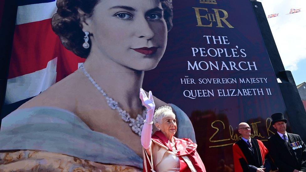 Woman dressed as the queen on Shankill Road