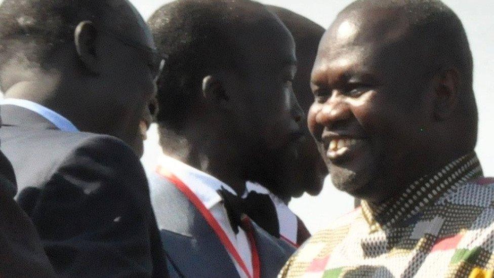 Riek Machar greeted on his arrival at Juba airport