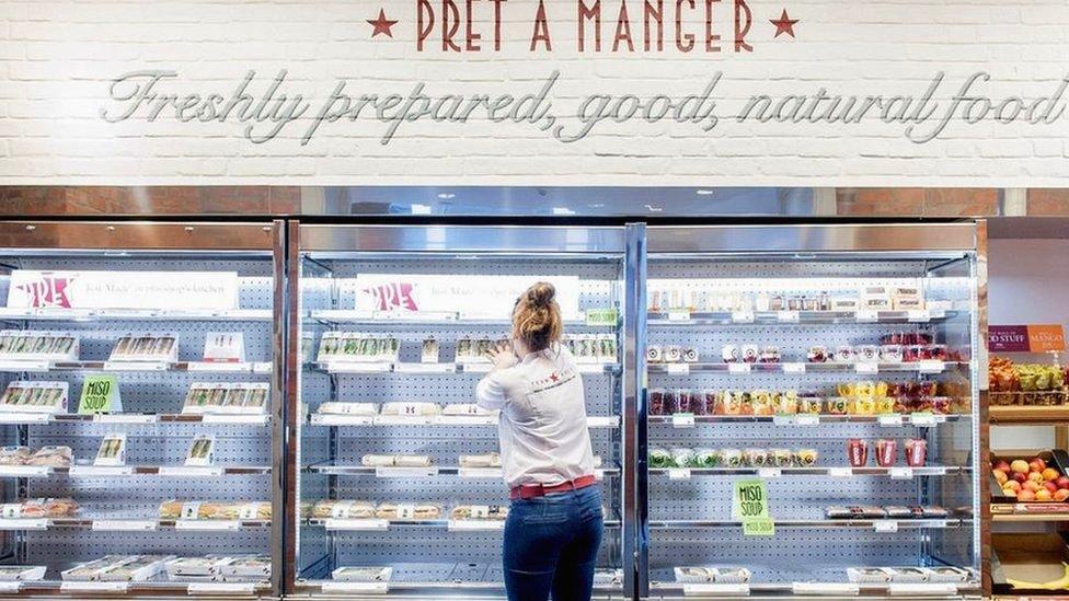 A staff member at Pret a Manger