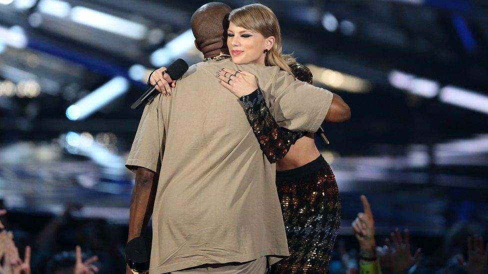 Kanye West and Taylor Swift hug