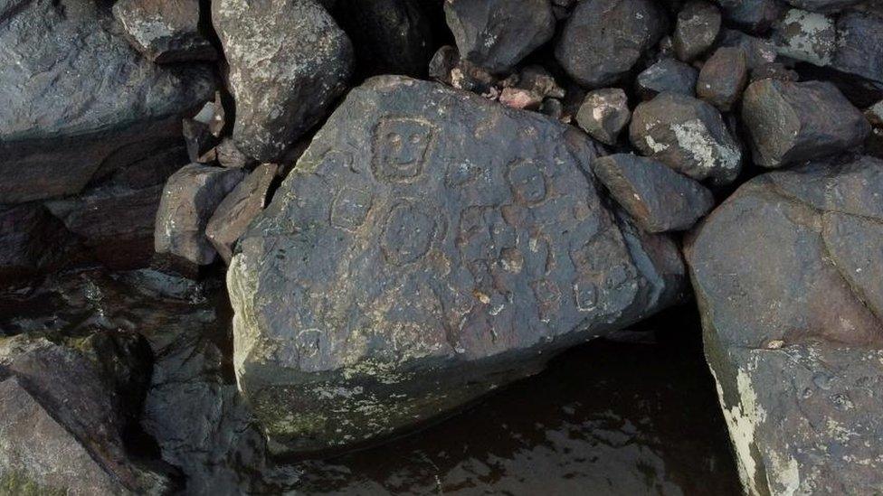 A view of ancient stone carvings on a rocky point of the Amazon river that were exposed after water levels dropped to record lows during a drought in Manaus, Amazonas state, Brazil October 23, 2023.