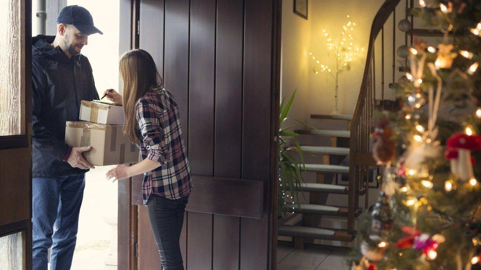 Woman receives Christmas delivery