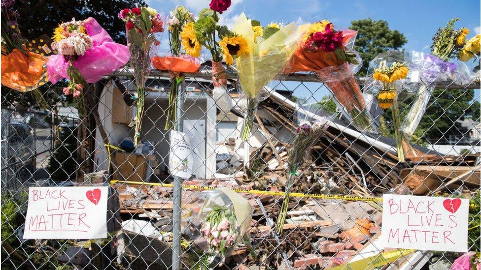 A memorial at the site of a June attack in Massachusetts that is being treated as a hate crime.