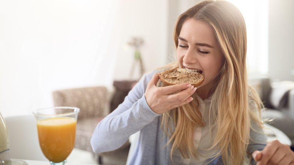 girl eating breakfast