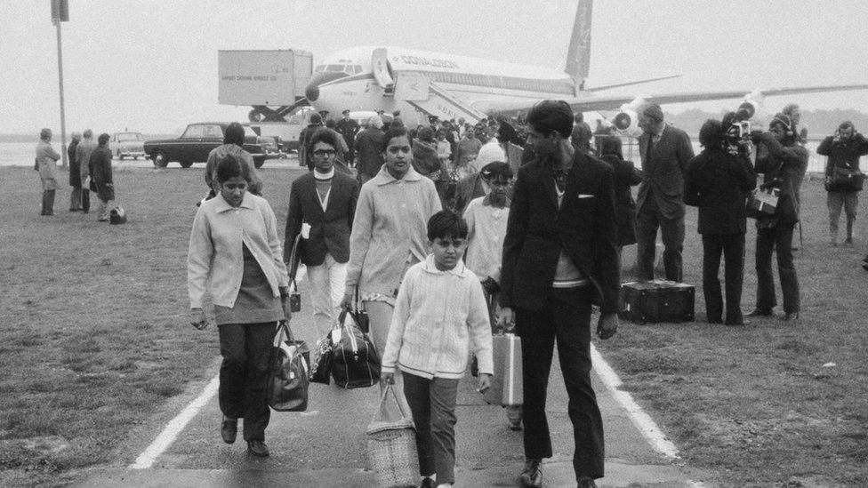 Ugandan Asian refugees arriving at Stansted Airport in September 1972