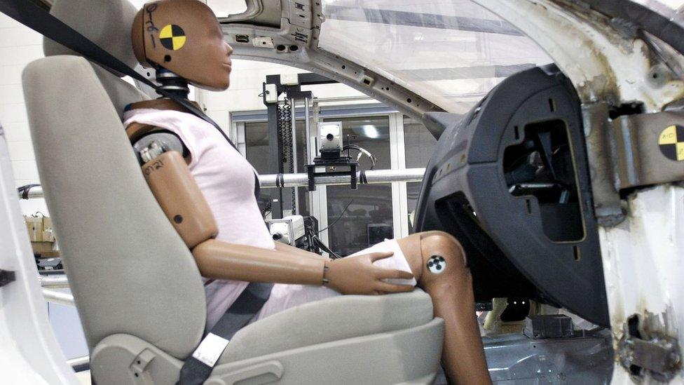 A crash-test dummy sits in a testing sled at Takata's current crash-testing facility in Michigan (2010)