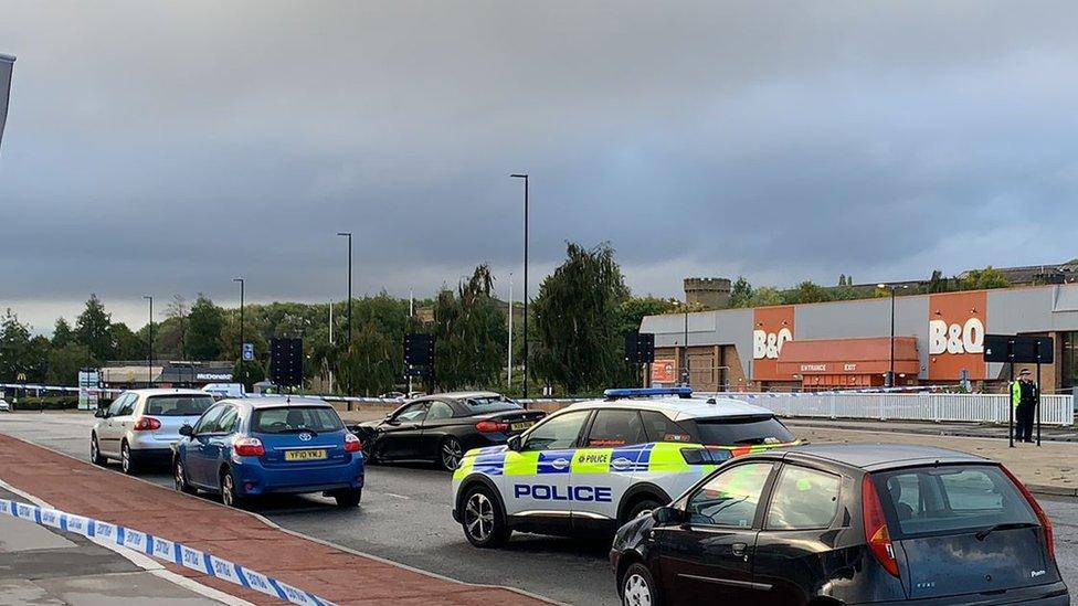 Damaged Black BMW at scene of crash in Penistone Road, Sheffield