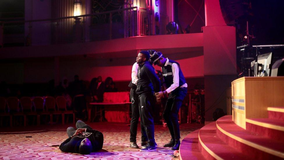 Members of the youth church perform in a knife crime play