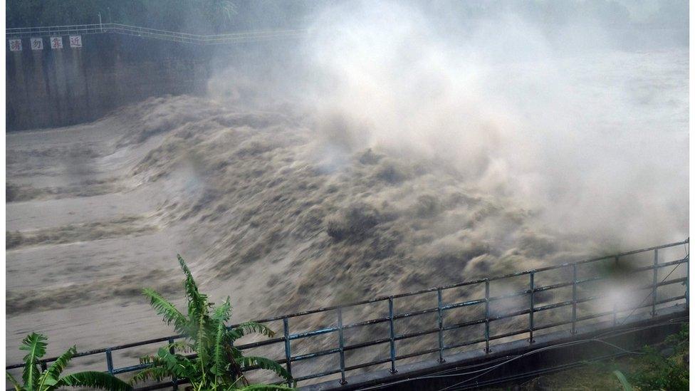 Churning waters at the Jhihtan Dam in Xindian district, New Taipei City, as Typhoon Megi hit eastern Taiwan on 27 September 2016.