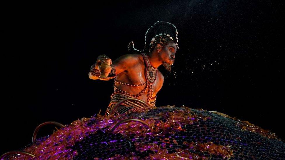 A man playing the orisha Exú takes part in the Grande Rio parade