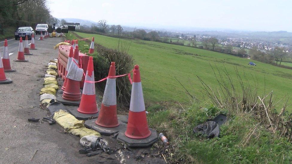 traffic cones at the side of the road