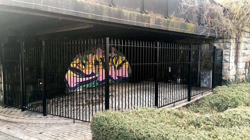 Fencing underneath a railway bridge in Cardiff