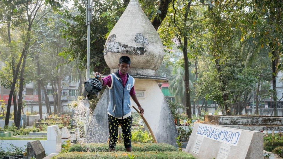 Watering at Azimpur cemetery