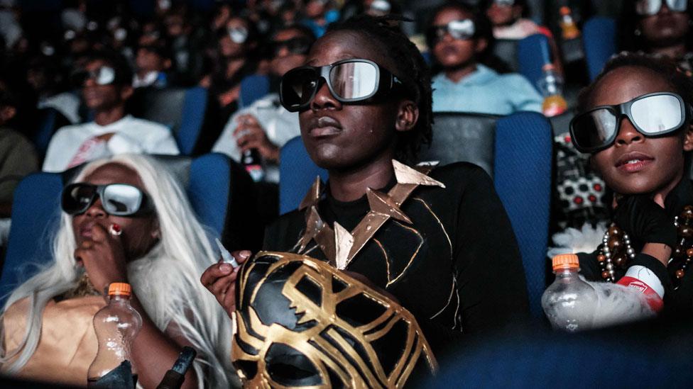 Cosplayers watch the film Black Panther in 3D during a screening in Nairobi, Kenya - 14 February 2018