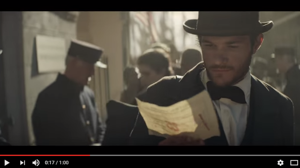 A still from the Budweiser Super Bowl advert showing company founder Adolphus Busch as an immigrant with a dream