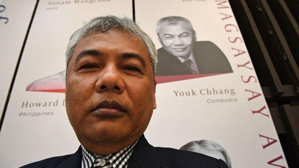 Youk Chhang of Cambodia, one of the winners of this year's Magsaysay Awards - widely regarded as Asia's version of the Nobel prize - poses for photos ahead of the awards ceremony in Manila on August 28, 2018.