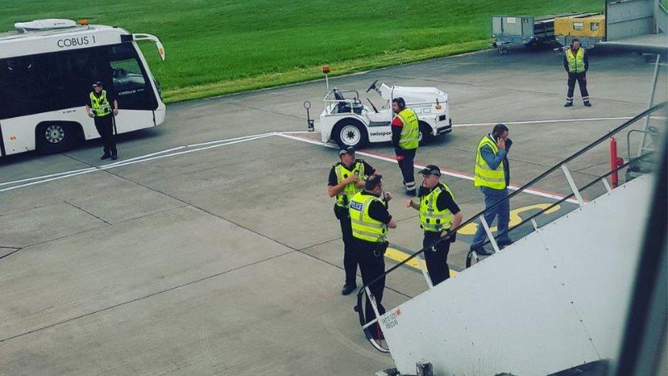 Police on the runway