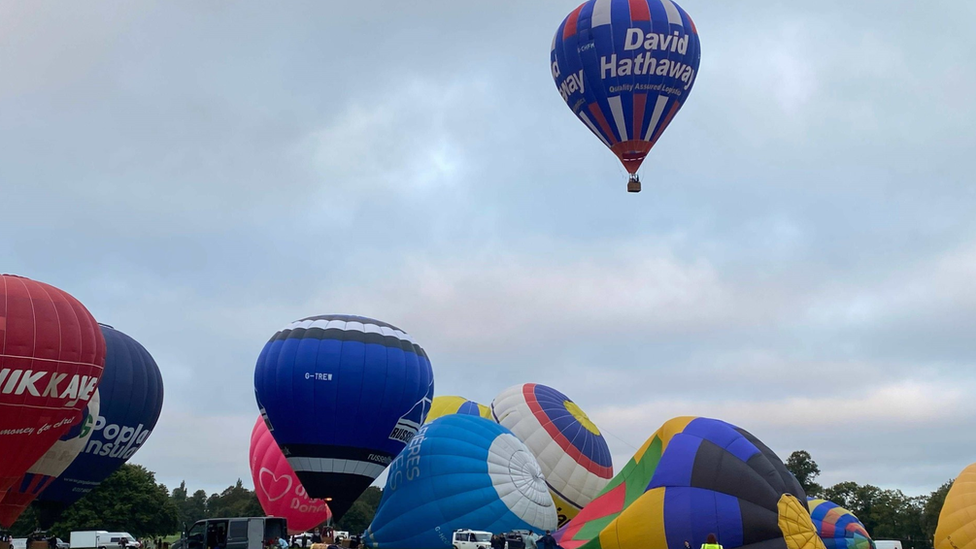 A hot air balloon flying in the sky