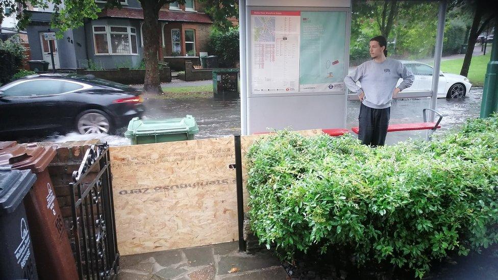 The makeshift defence created by residents in Woodford to protect their homes from floodwater