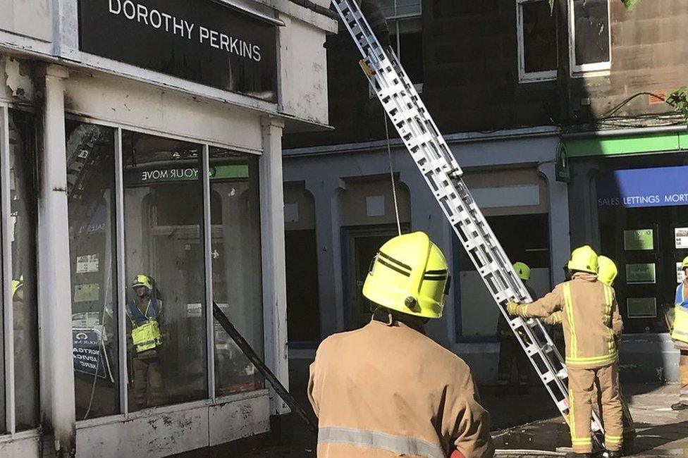 Firefighters at Dorothy Perkins in Dumfries