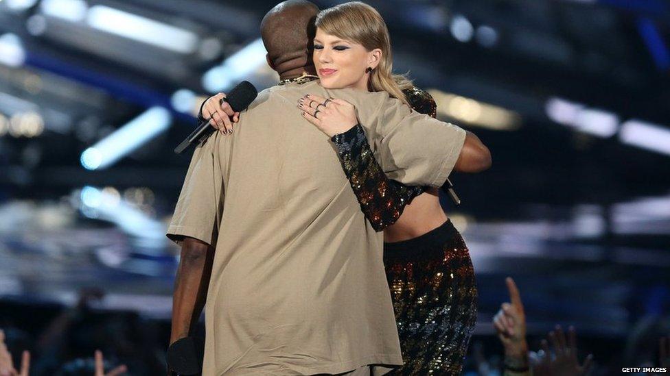 Kanye West and Taylor Swift hug