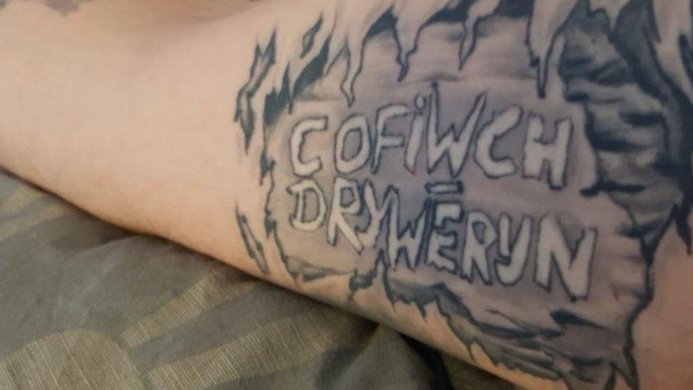 A tattoo with 'Cofiwch dryweryn'