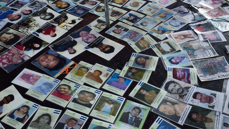 Mothers of the missing migrants place their pictures in a brother of the city of Tapachula, in the south of Mexico