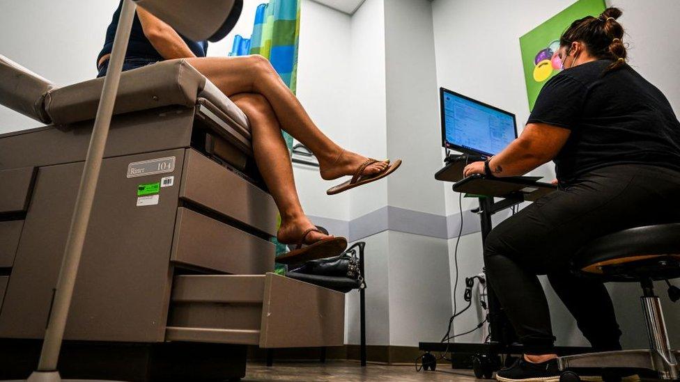 Woman at doctor office