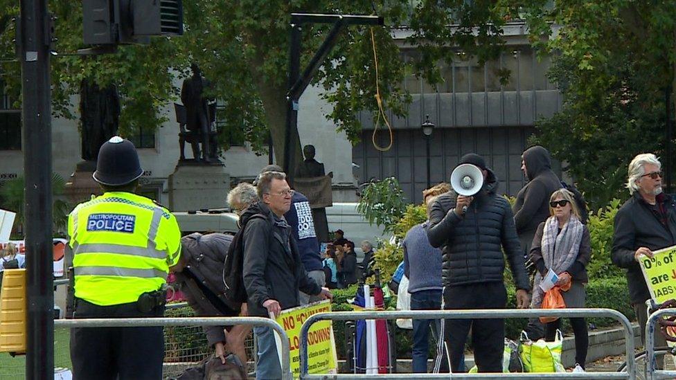 Protesters with gallows