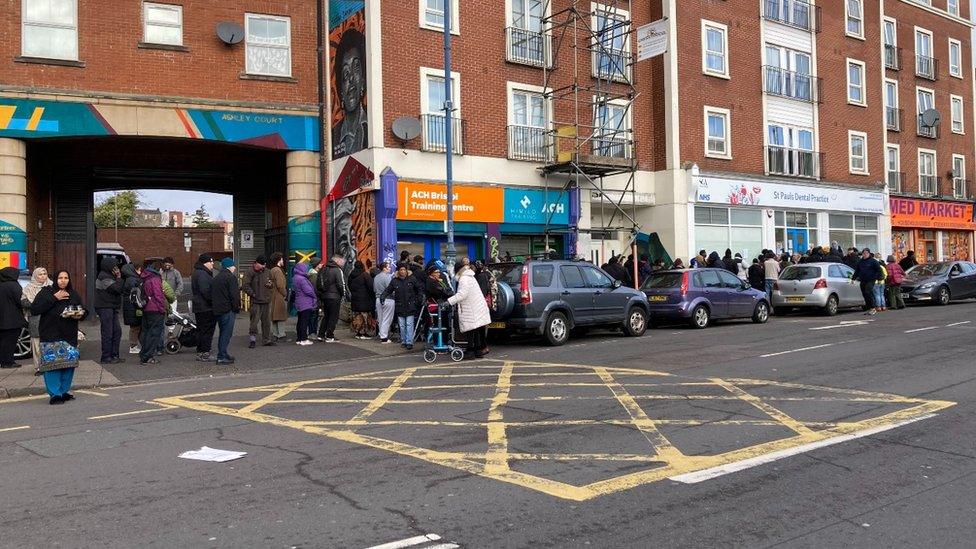 People queuing to register at an NHS dentist in Bristol