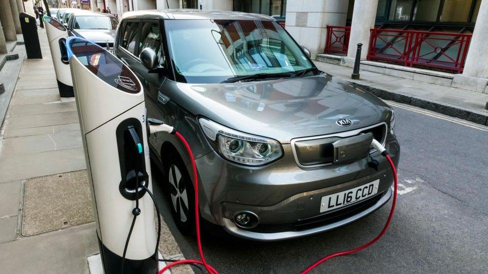 An electric car at a charging point in London