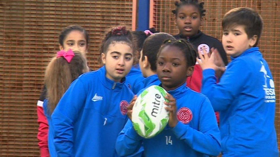 Children playing rugby