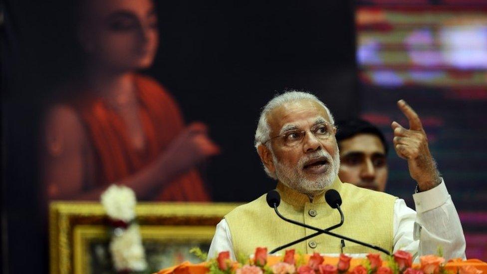 Indian Prime Minister Narendra Modi speaks during the centenary celebration of missionary organisation the Gaudiya Math and Mission at the Netaji Indoor Stadium in Kolkata on February 21, 2016