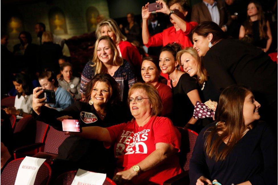 Cruz supporters snap a selfie ahead of the September debate