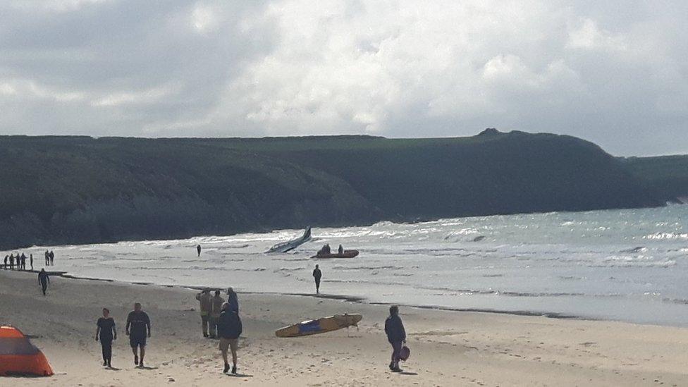 A plane in the sea at Whitesands Bay