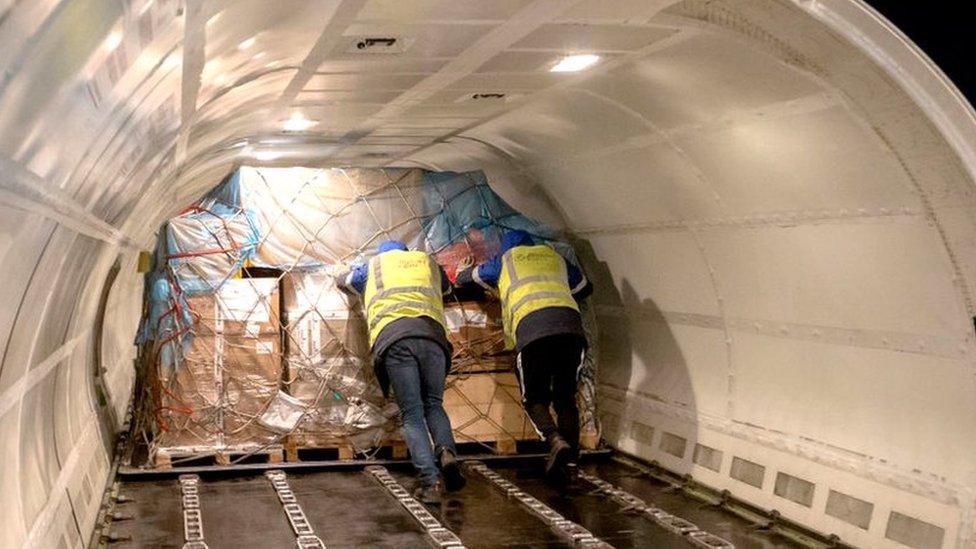 Loading a Boeing-737 plane operated by the Volga-Dnepr cargo airline at Vnukovo International Airport