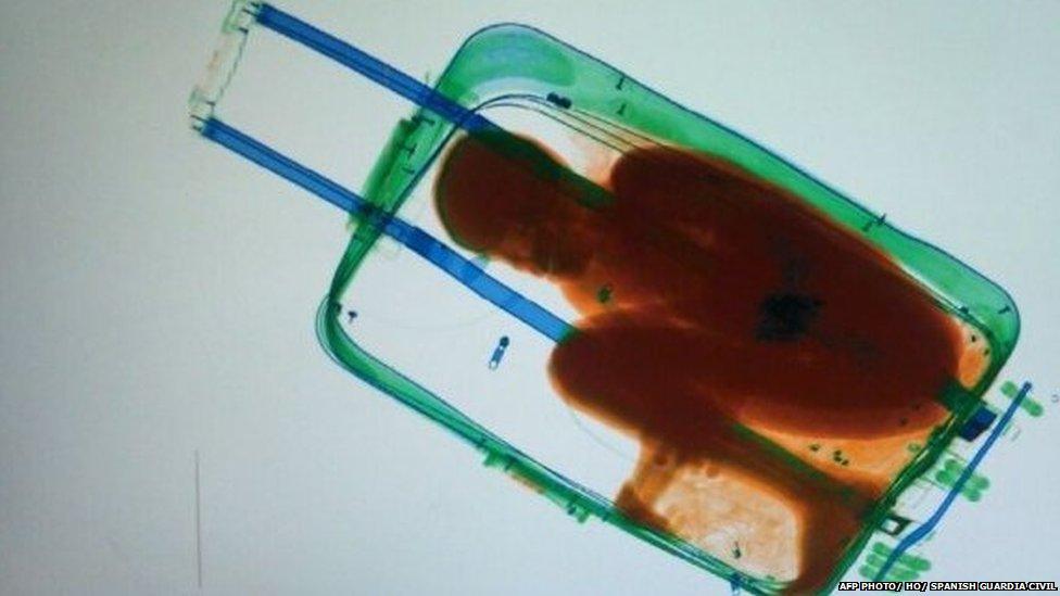 A picture provided by Spanish Guardia Civil on May 8, 2015 shows an X-ray image showing an 8-year-old sub-Saharan boy hidden in a suitcase.