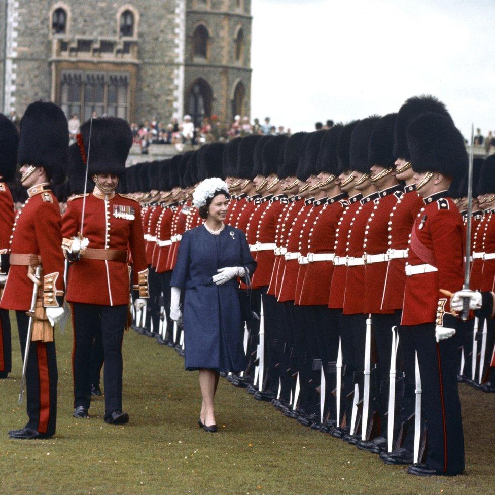 Inspecting the 1st and 2nd Battalions Coldstream Guards, at Windsor, as Sovereign.