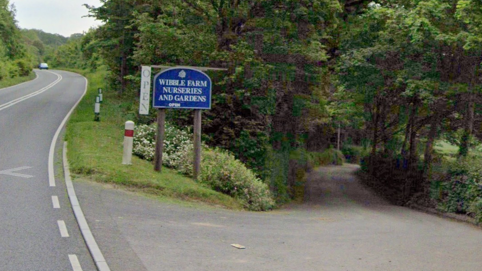 Wibble Farm Nurseries sign at the side of a road