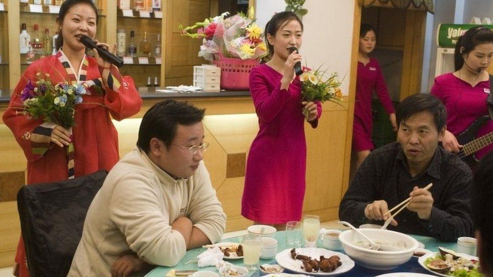 North Korean women perform in a restaurant in Liaoning, China (file image)