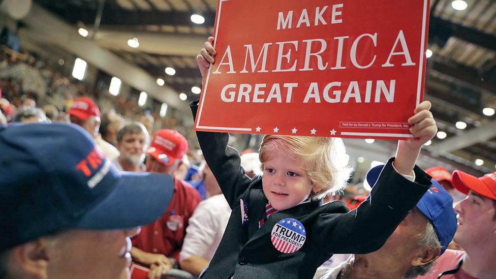 Six-year-old Eli Townsend dressed like Donald Trump at a campaign rally in Jacksonville, Florida - 3 November 2016