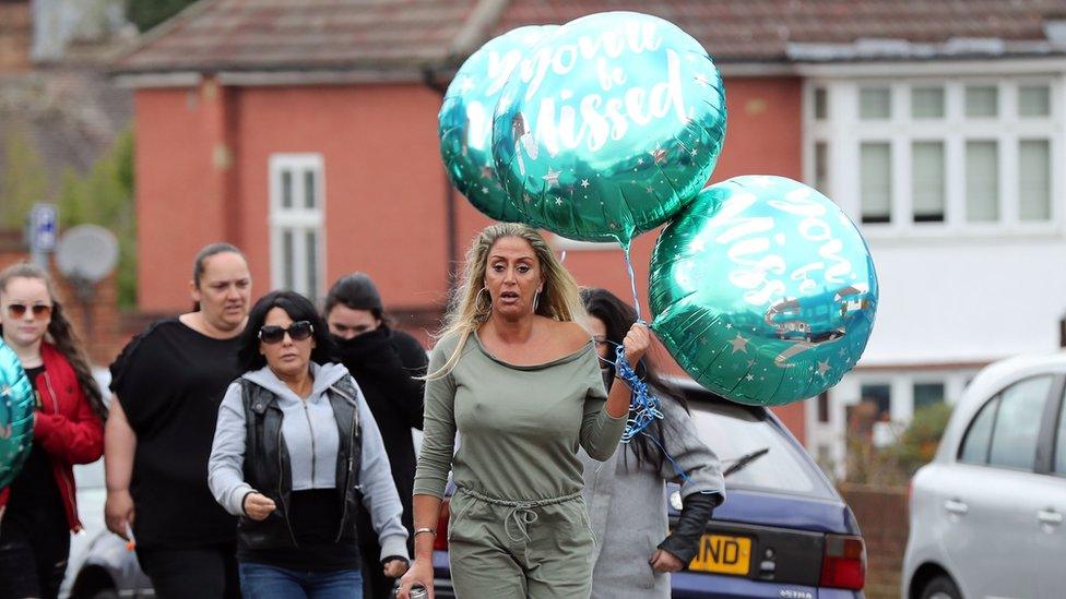 Friends and relatives of Henry Vincent bring birthday tributes to the scene on South Park Crescent in Hither Green