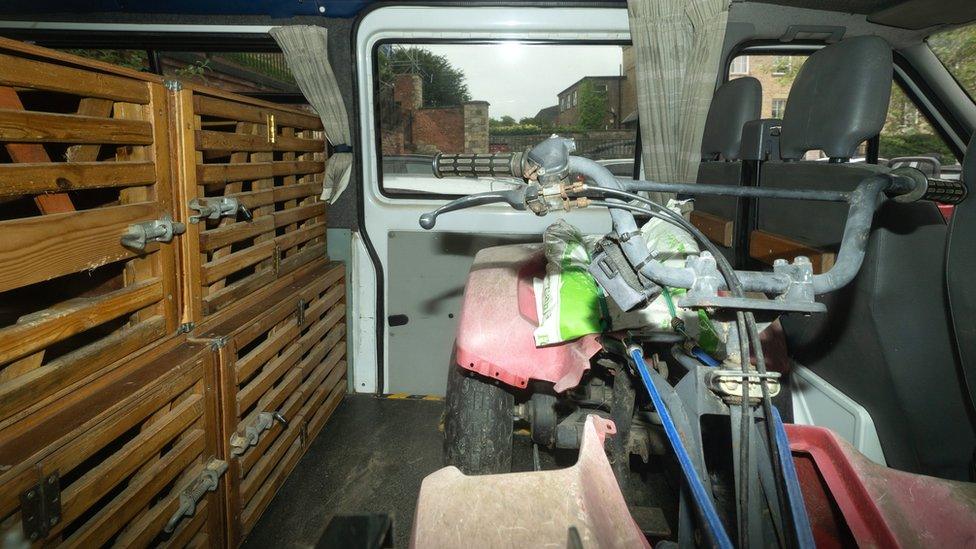 Dog cages inside Vince King's van