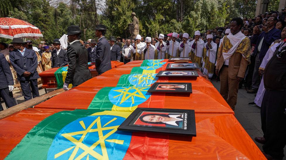 Coffins representing Ethiopian passengers and crew who perished in the Ethiopian Airways ET302 crash are lined up during a memorial service at Selassie Church on March 17, 2019 in Addis Ababa, Ethiopia.