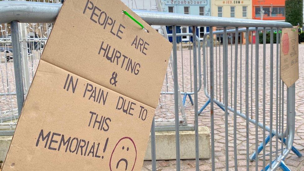 Abuse memorial protest placard