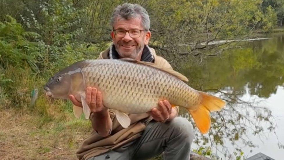 Angler Kevin Charman with a carp